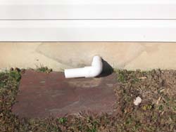 proper sump pump discharge to exterior of dwelling