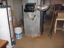 rusted out furnance from
								humidifier leak
